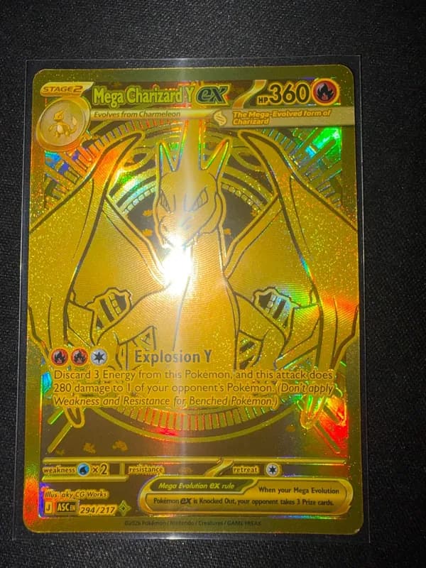 Mega Charizard Y ex, an English gold card with spots on the gold surface