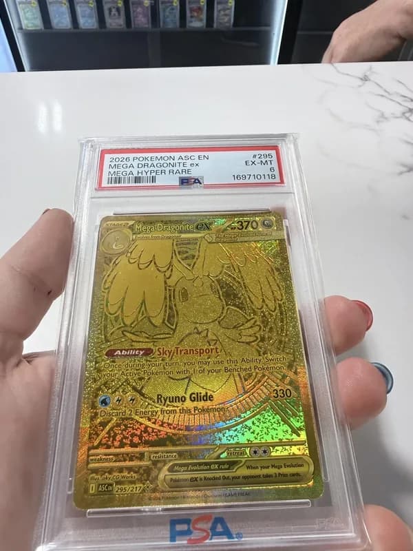 Mega Dragonite ex (PSA 6), an English gold card with spots on the gold surface